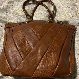 Coach brown mixed leather tote with gold hardware